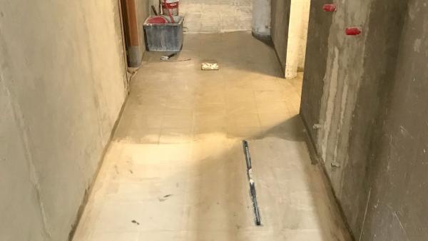 Corridor with footwasher under construction