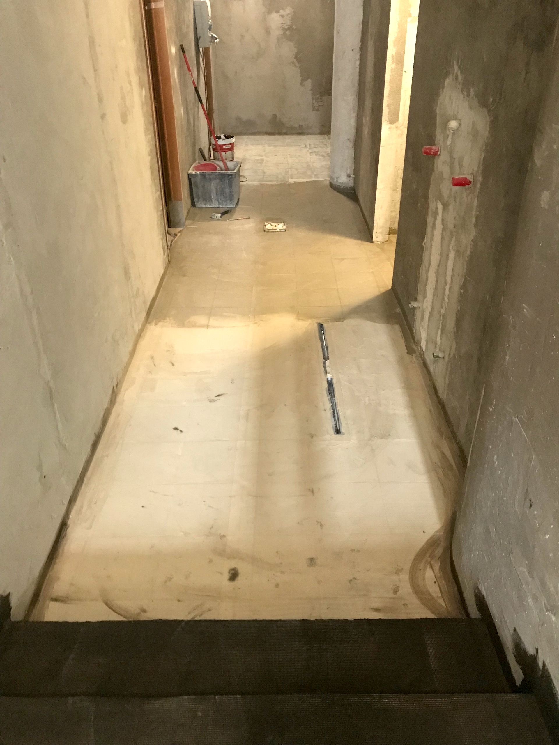 Corridor with footwasher under construction