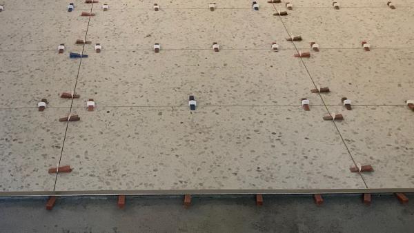 Laying of large format tiles