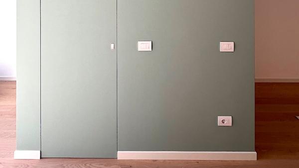 Lavanderia con porta filomuro