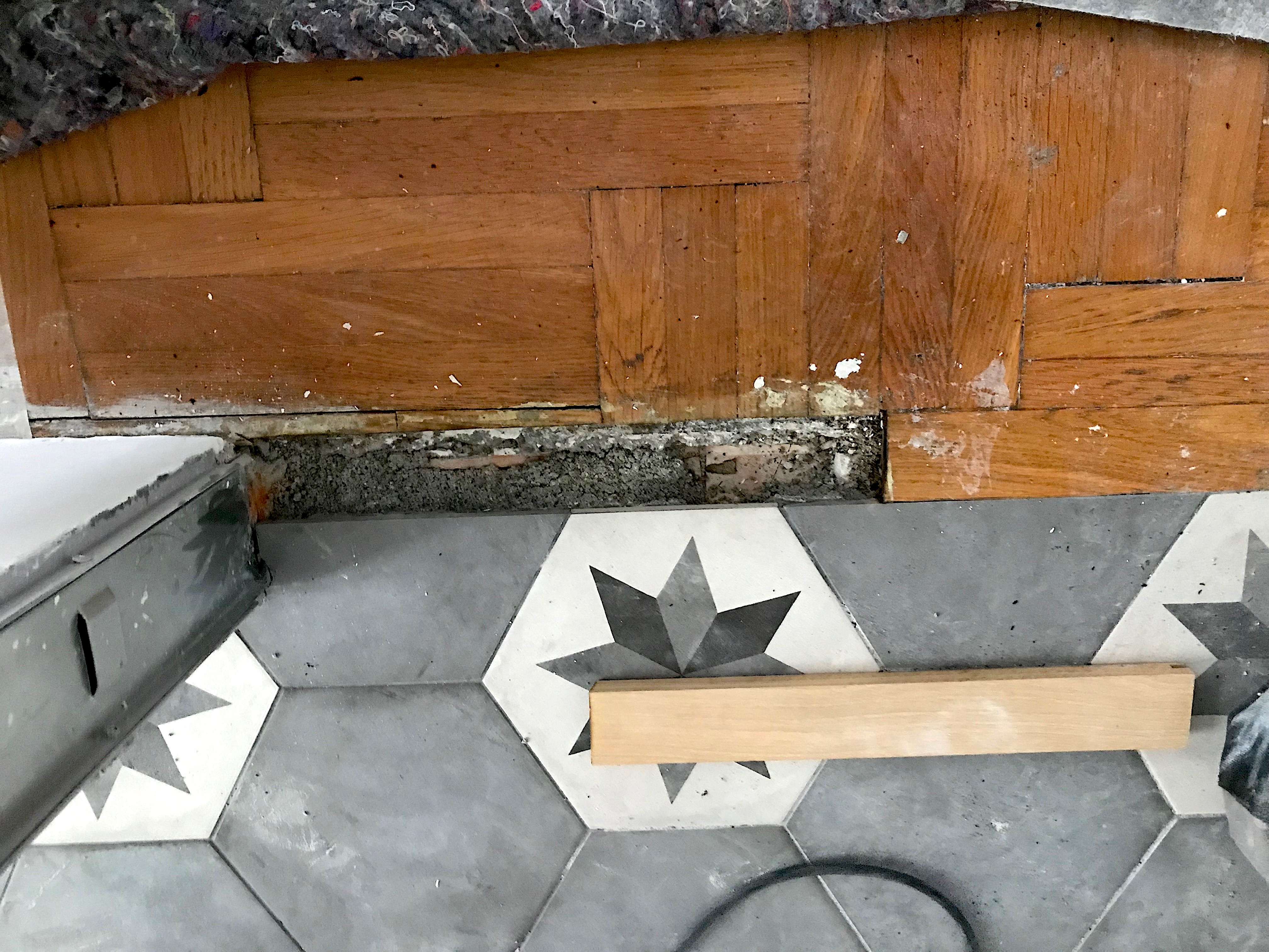 Posa complanare tra due pavimentazioni differenti 